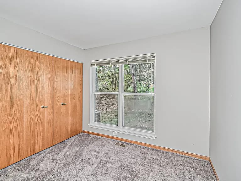 Alternate view of the primary bedroom and closet