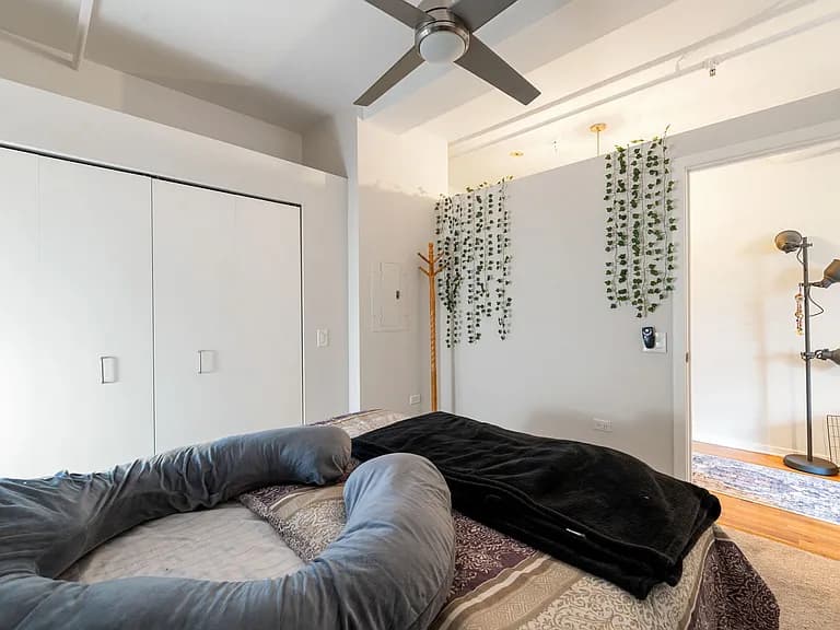 Alternate view of the primary bedroom and closet